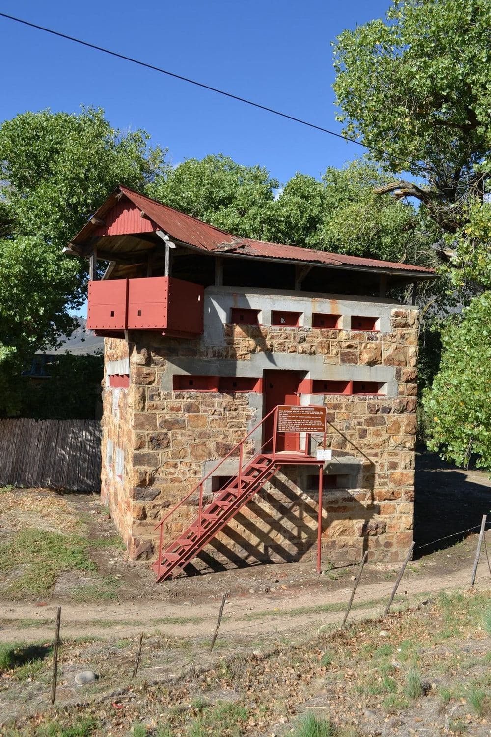 The Wolseley blockhouse: stone tower with red steel lookout deck